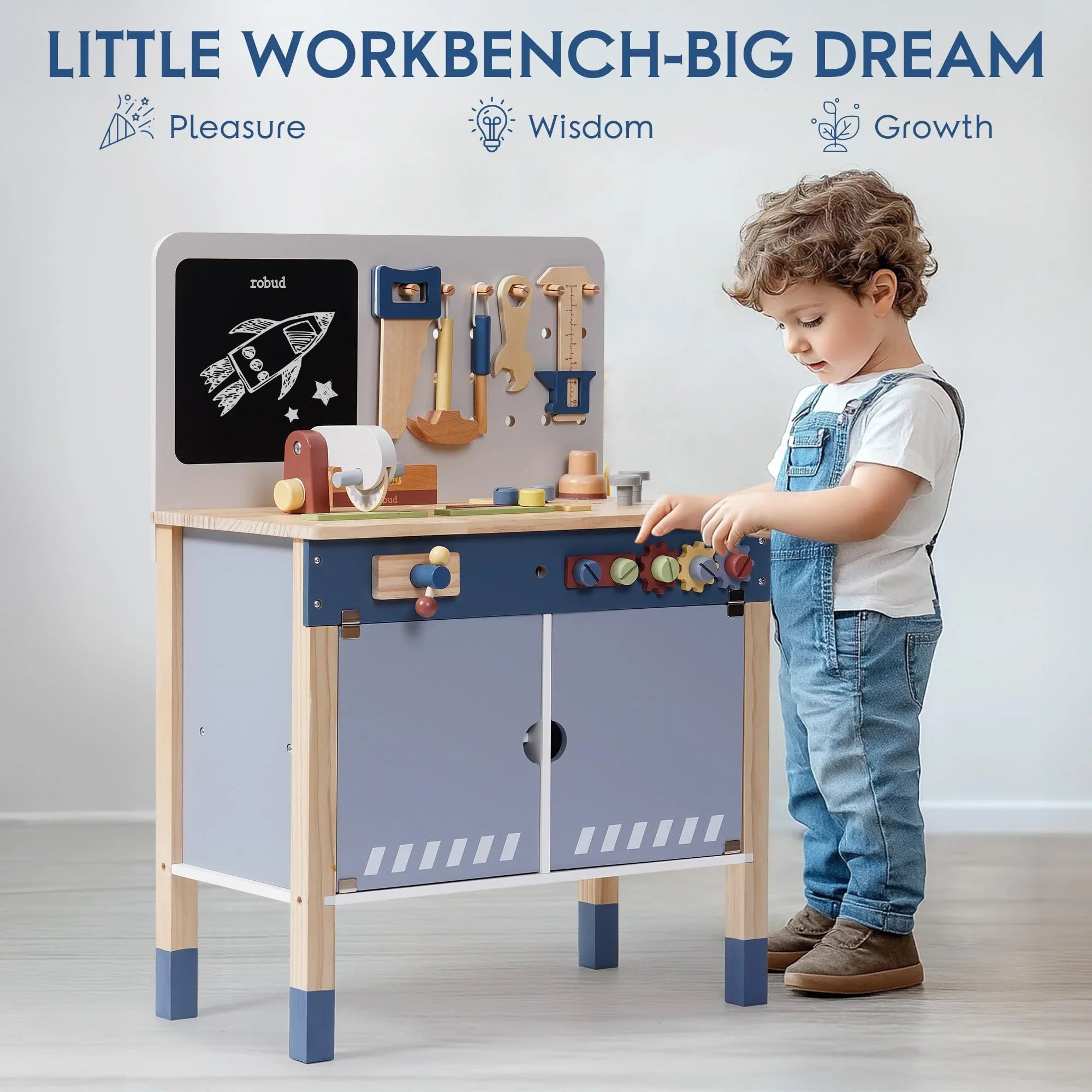 Child playing with robud wooden toy workbench in a room with a white wall and wooden floor.