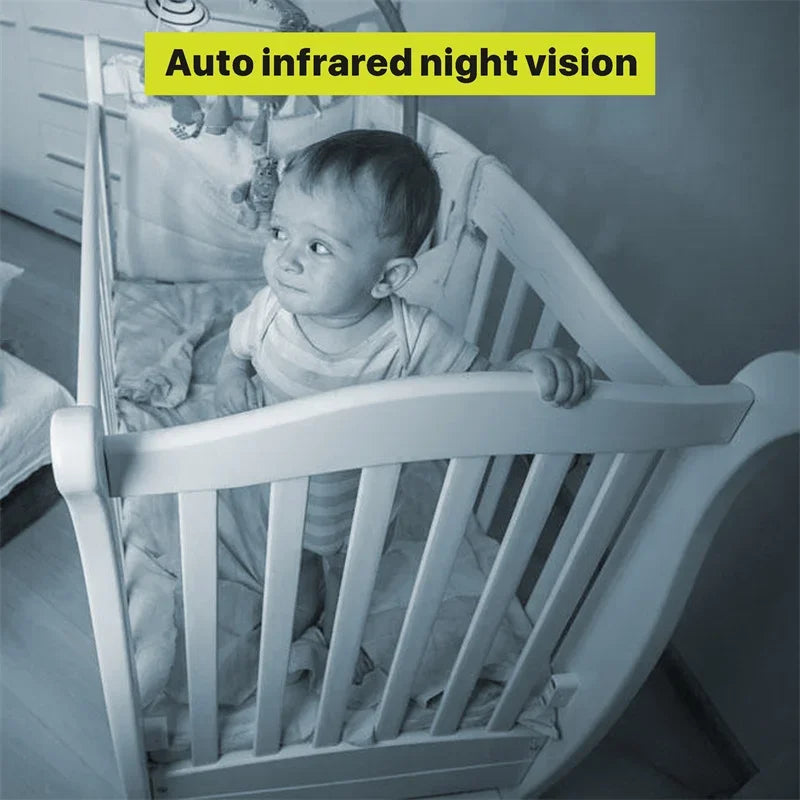 Baby in a crib monitored with infrared night vision camera