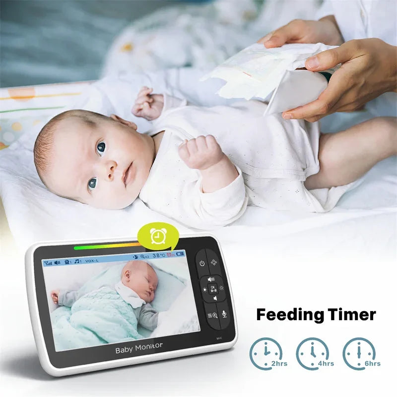 Baby monitor LCD display showing feeding timer reminder feature for scheduled feeds