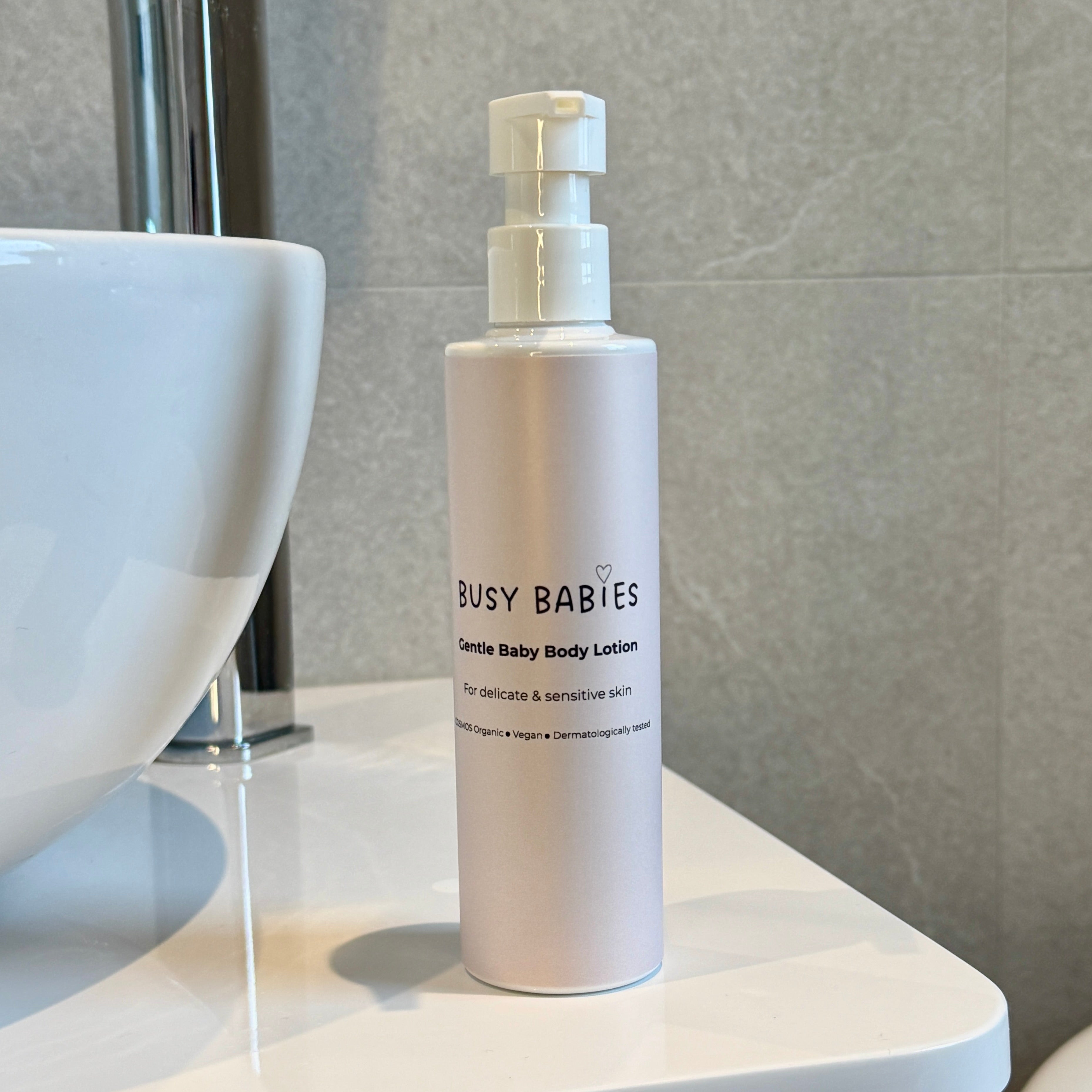 Busy Babies Gentle Baby Body Lotion bottle on a bathroom counter