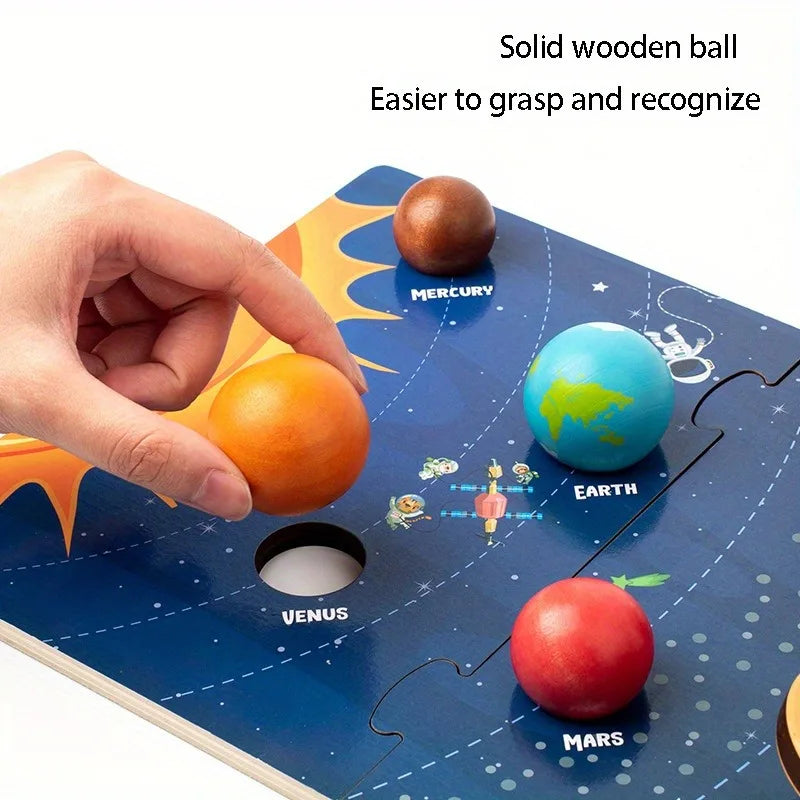 Solar system model with colourful wooden planets on a blue card labeled with planet names.