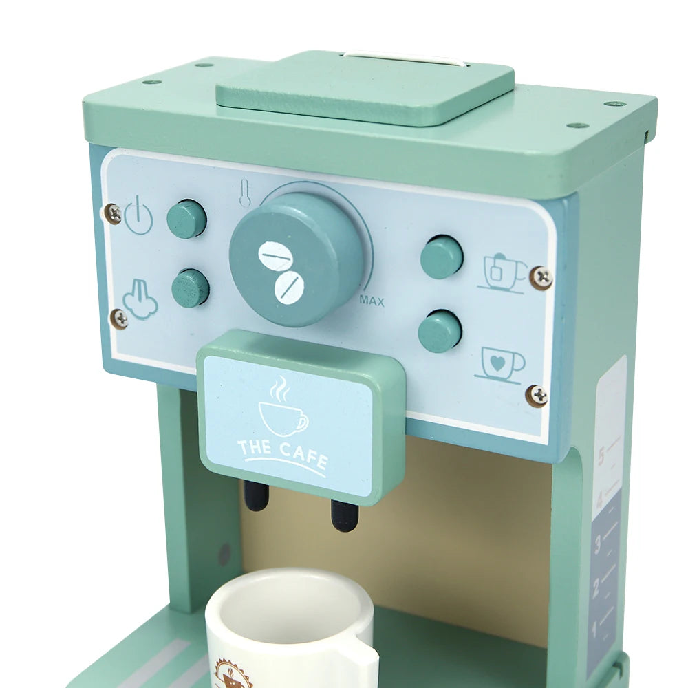 Toy coffee machine with a cup on a white background